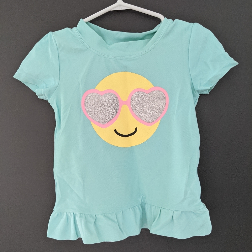 Light blue smiley face rashguard swimsuit top